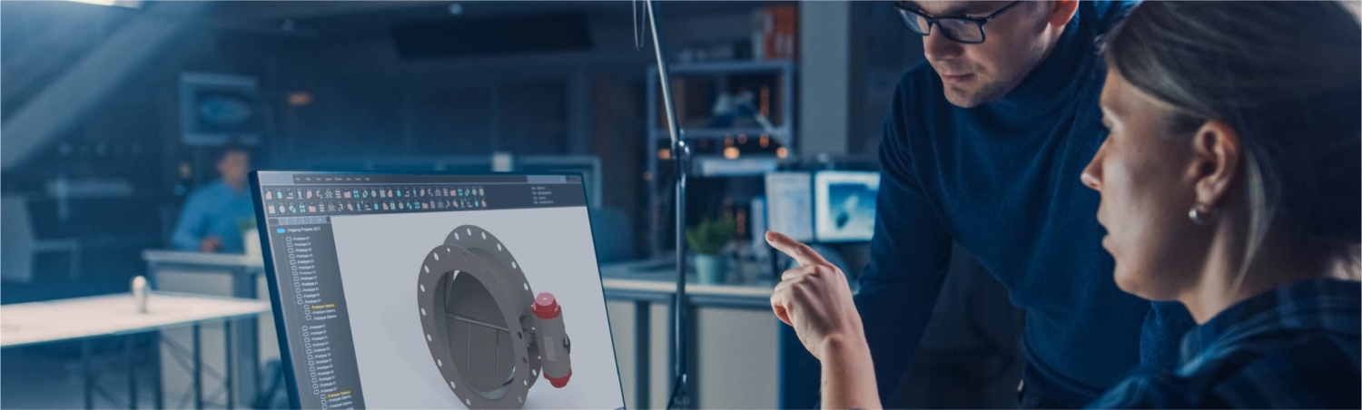 photo: two industrial designers review a damper image on a laptop
